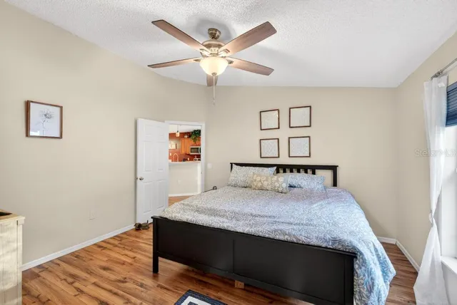 a en suite bathroom with a sink and mirror