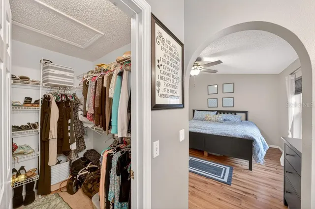 a bathroom with a sink double vanity granite tub and a mirror