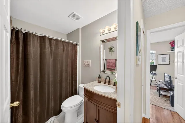 a view of a backyard of the house