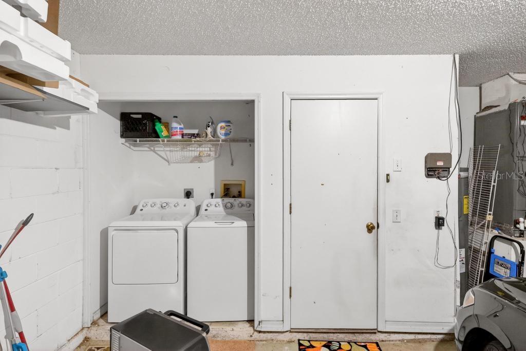 1332 Honey Road Apopka, FL 32712 - Photo 48 of 59 a utility room with dryer and washer