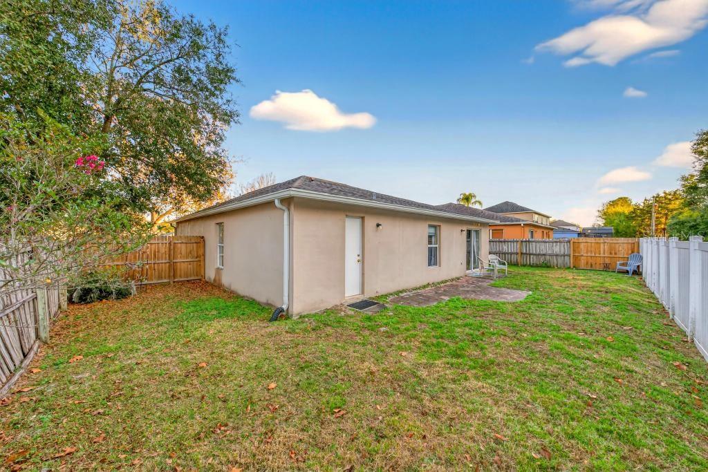 1332 Honey Road Apopka, FL 32712 - Photo 51 of 59 a view of a backyard of the house