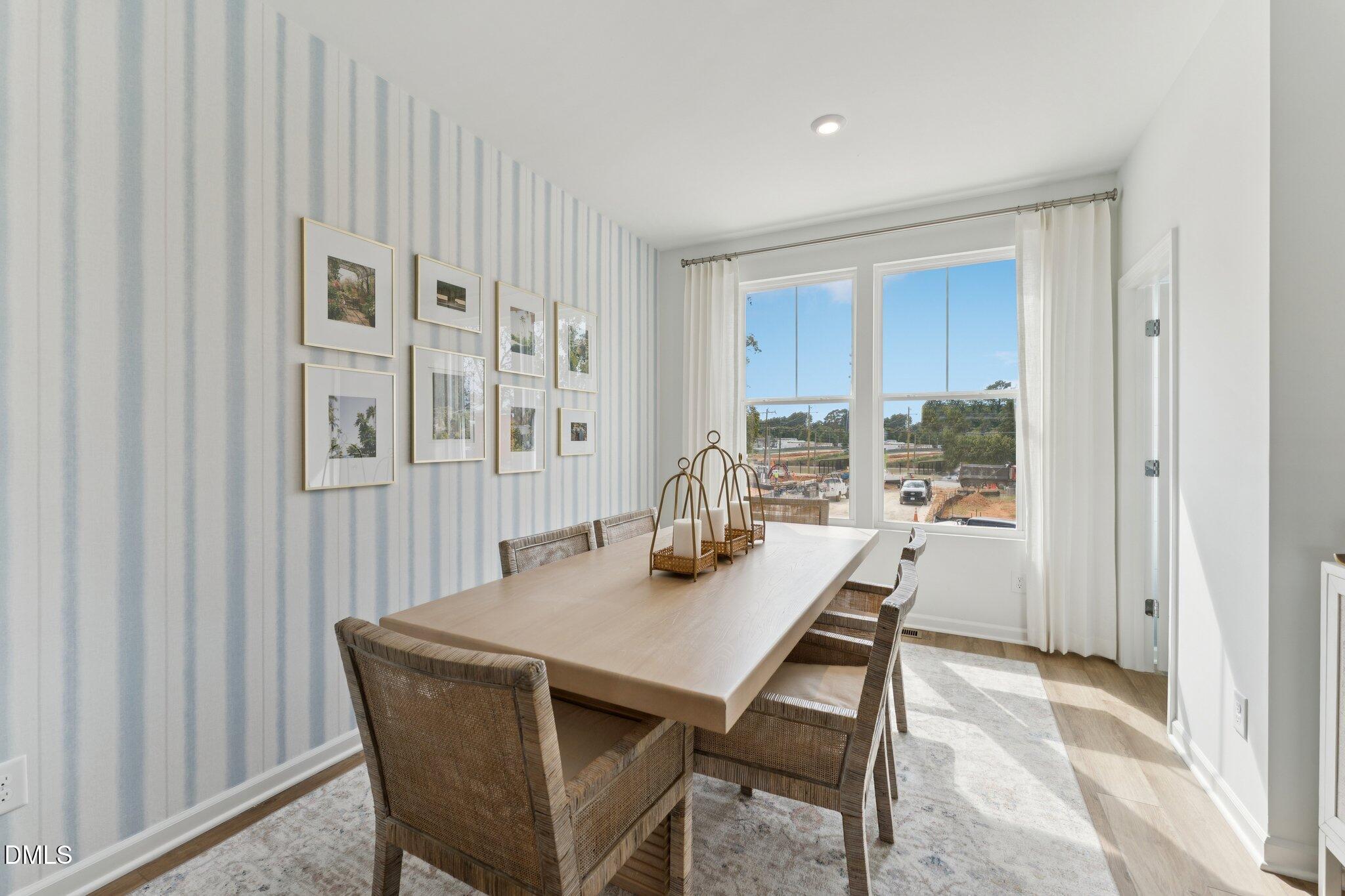 3320 Bomore Road Raleigh, NC 27610 - Photo 9 of 37 a dining room with furniture and window