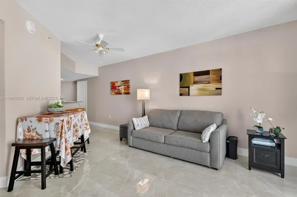 a living room with furniture and a couch
