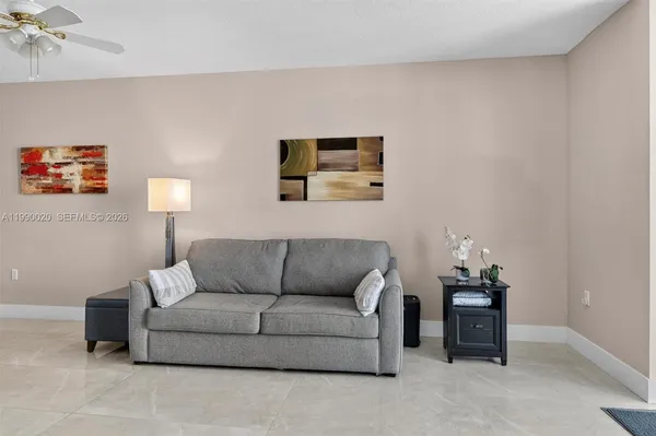 a view of a livingroom with furniture and wooden floor
