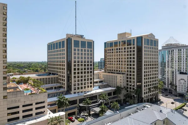 a spacious bathroom with a double vanity sink and a mirror