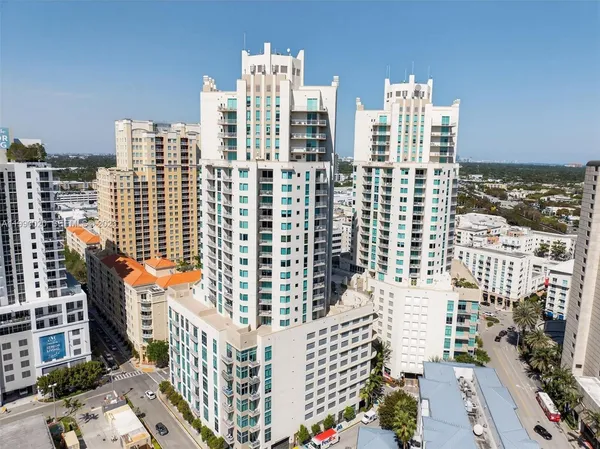 a view of a patio with table and chairs