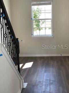 2737 Franklin Road St. Cloud, FL 34771 - Photo 4 of 4 a view of a room with wooden floor and windows