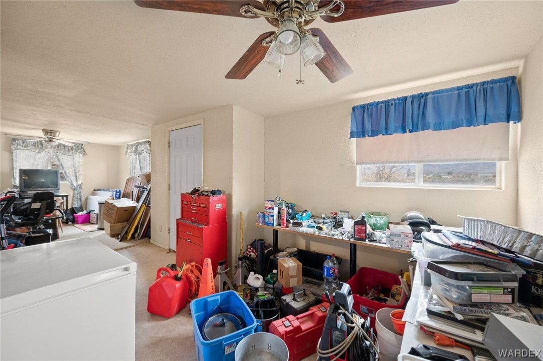 4053 Cowlic Road Golden Valley, AZ 86413 - Photo 23 of 25 a view of a room with gym equipment