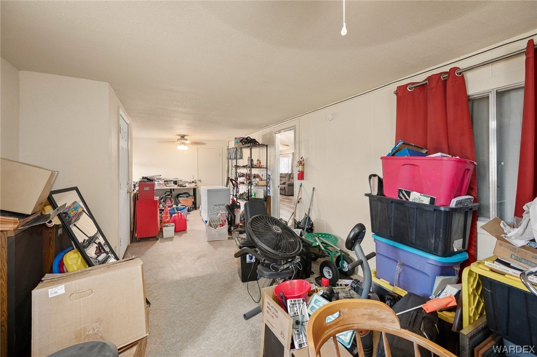 4053 Cowlic Road Golden Valley, AZ 86413 - Photo 24 of 25 a view of a room with gym equipment