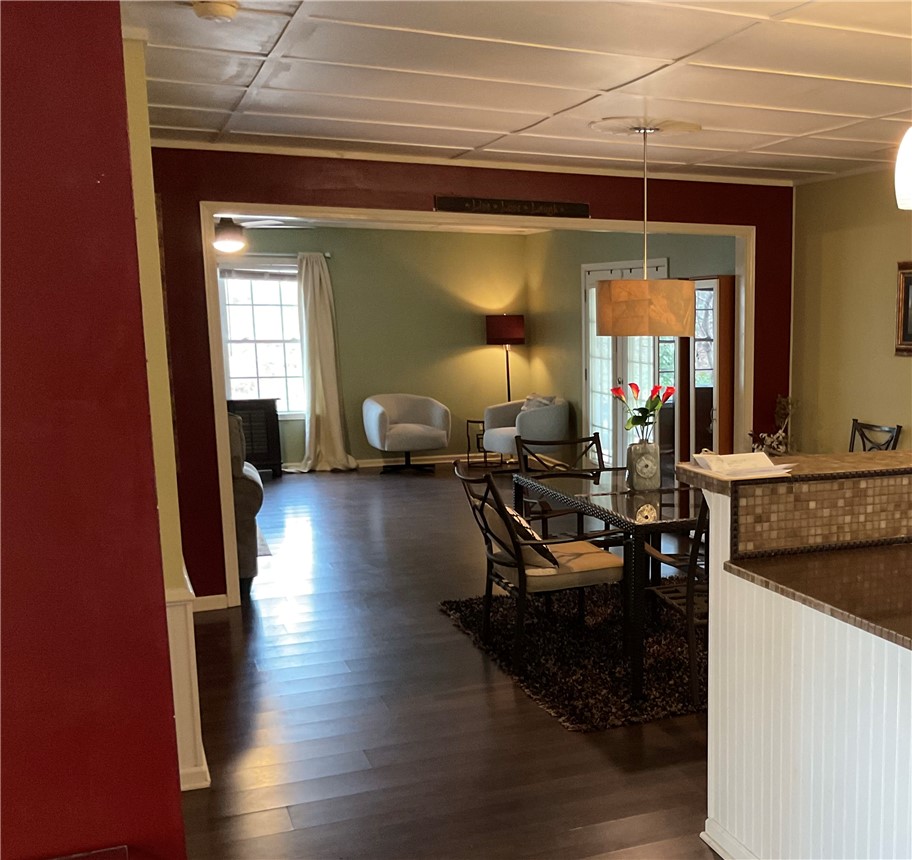 229 Cub Cove Drive Walhalla, SC 29691 - Photo 16 of 50 This inviting space features an open layout with rich flooring and distinct architectural details.