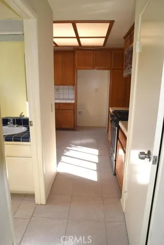 a view of entryway with a vanity and a window