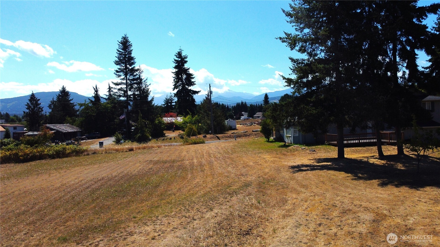 -xx Williamson Road Sequim, WA 98382 - Photo 1 of 22 a view of a road with a yard