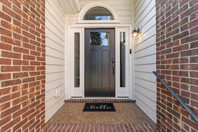 a view of a brick house with a door