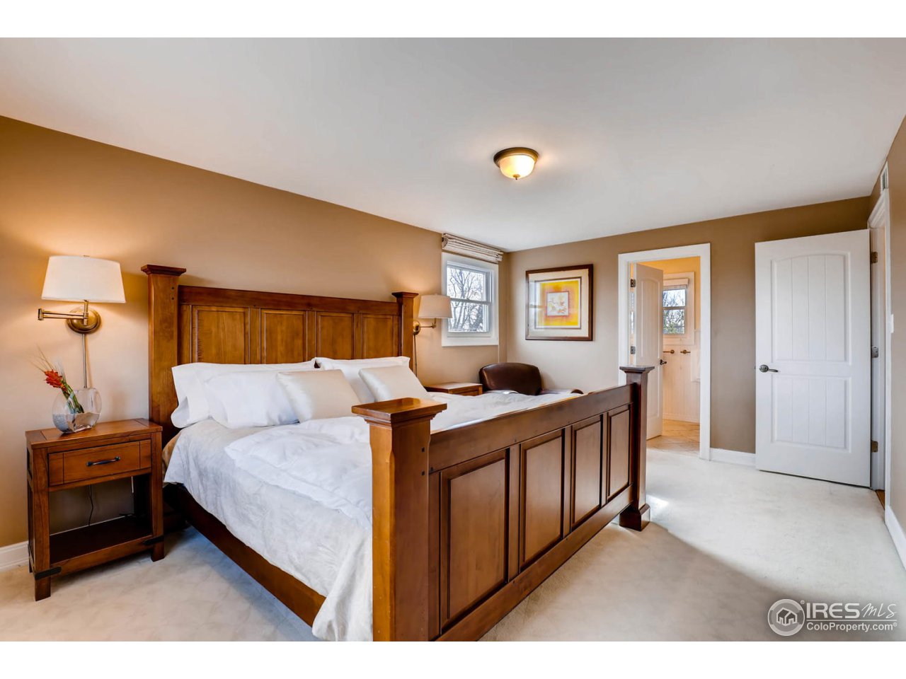 2610 Regis Drive Boulder, CO 80305 - Photo 11 of 29 a bedroom with a bed and a large window