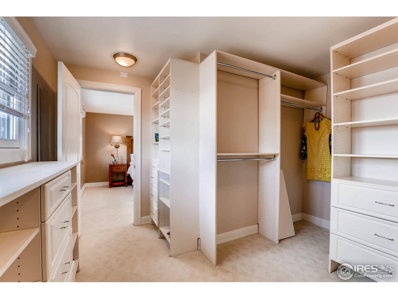 2610 Regis Drive Boulder, CO 80305 - Photo 14 of 29 a view of hallway with walk in closet and bathroom