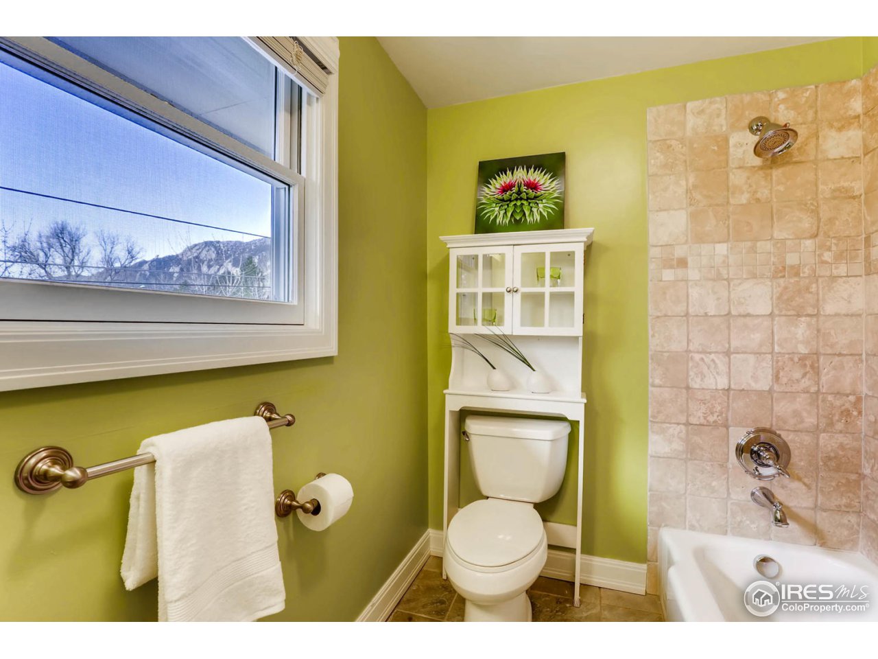 2610 Regis Drive Boulder, CO 80305 - Photo 16 of 29 a bathroom with a toilet sink and mirror