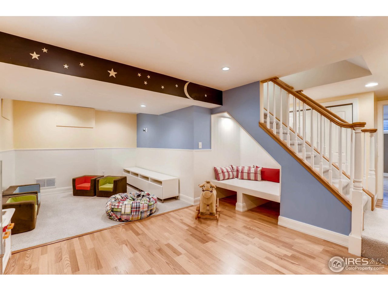 2610 Regis Drive Boulder, CO 80305 - Photo 18 of 29 a living room with furniture and a wooden floor