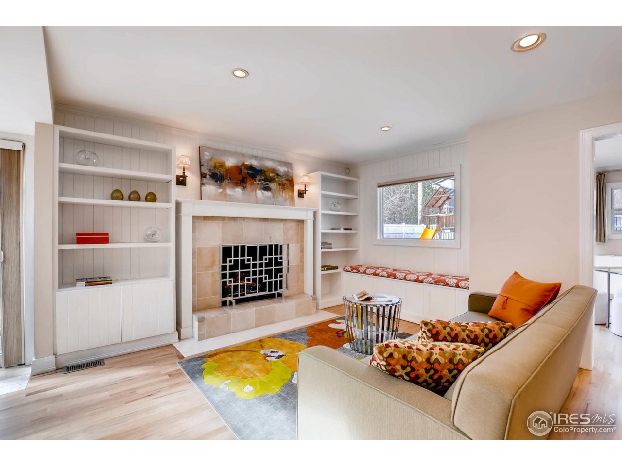 2610 Regis Drive Boulder, CO 80305 - Photo 2 of 29 a living room with furniture and a fireplace