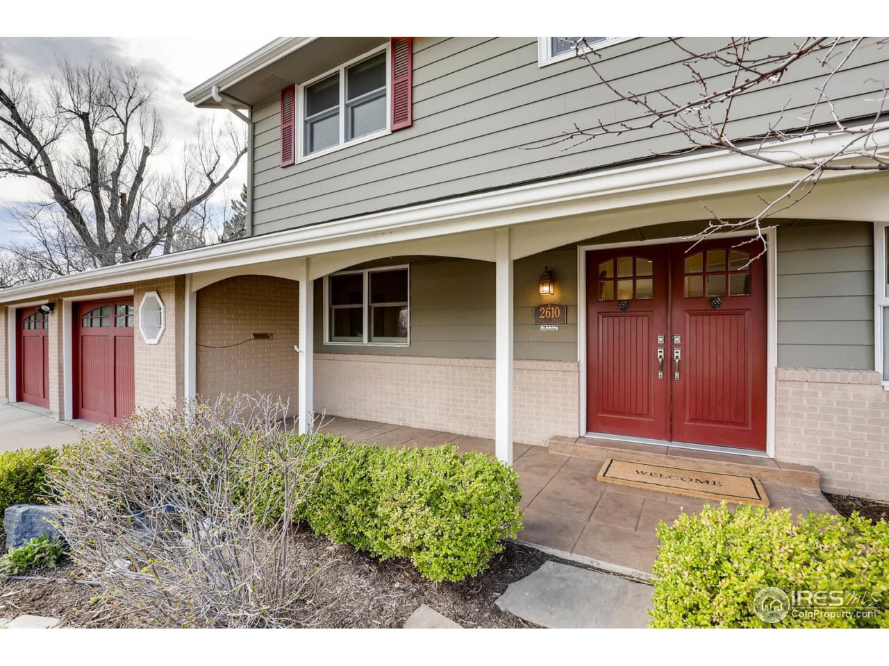 2610 Regis Drive Boulder, CO 80305 - Photo 29 of 29 a front view of a house with garden