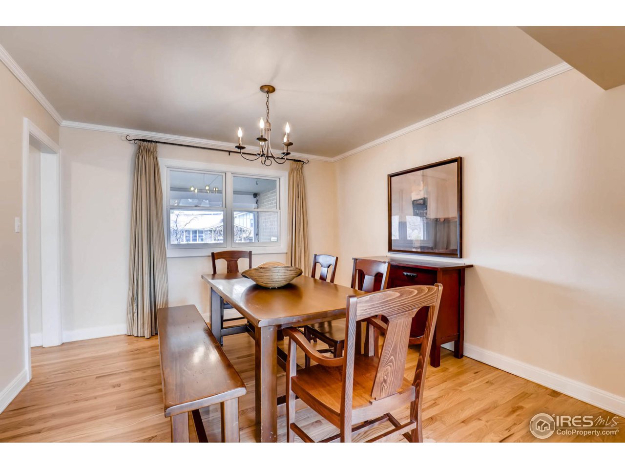 2610 Regis Drive Boulder, CO 80305 - Photo 6 of 29 a view of a dining room with furniture and wooden floor