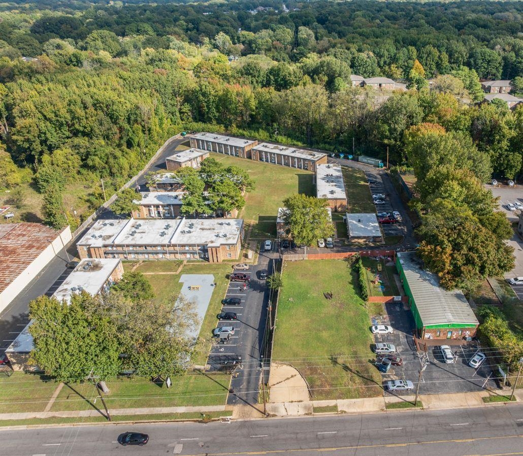 3236 Millington Road Memphis, TN 38127 - Photo 30 of 31 Property featuring multiple multi-unit residential buildings, ample surface parking, and extensive green spaces