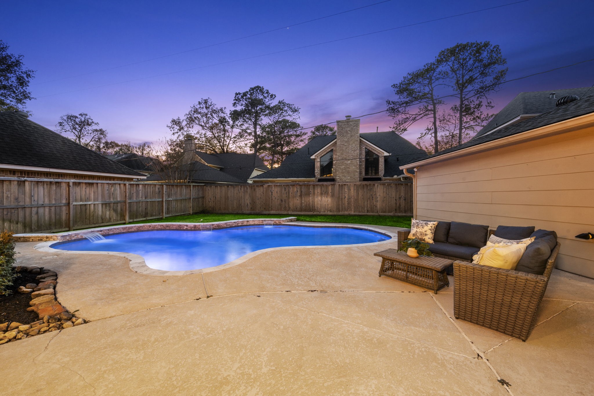 16111 Maplehurst Drive Spring, TX 77379 - Photo 28 of 30 a view of a swimming pool with a patio