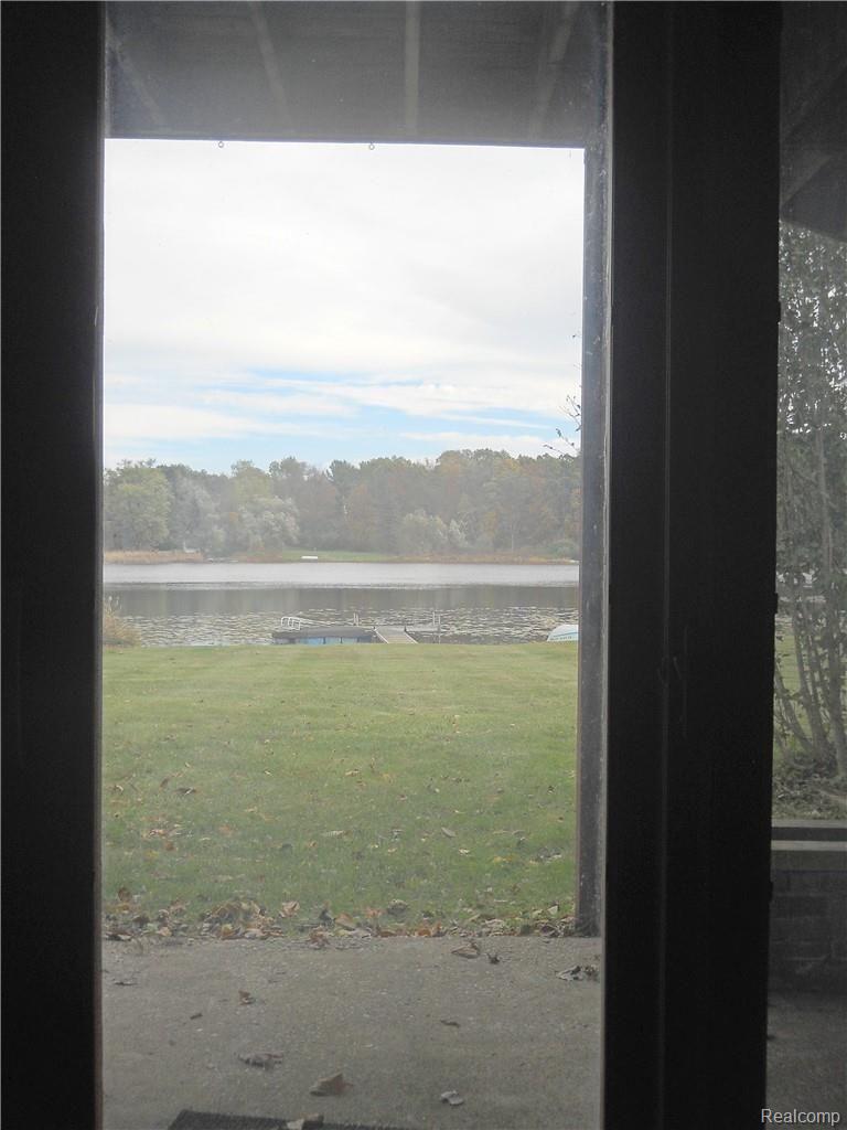 4237 Rurik Drive Howell, MI 48843 - Photo 27 of 37 lake view out basement doorwall