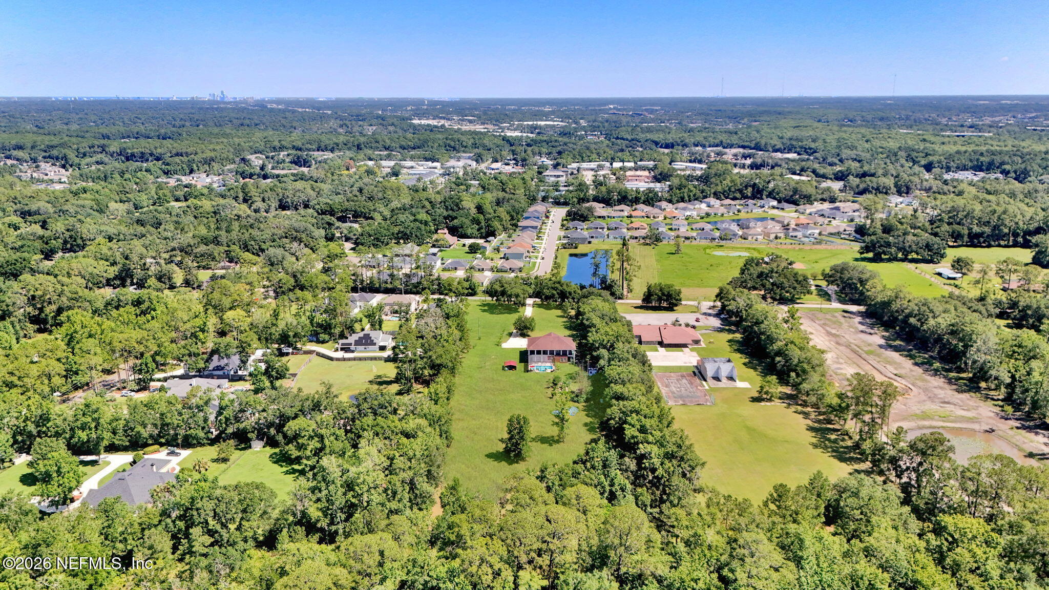 5052 Lourcey Road Jacksonville, FL 32257 - Photo 70 of 75 12-web-or-mls-DJI_20260624231504_0021