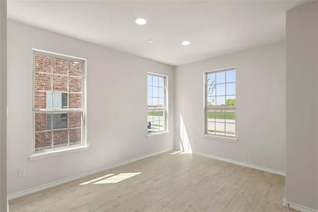 an empty room with windows