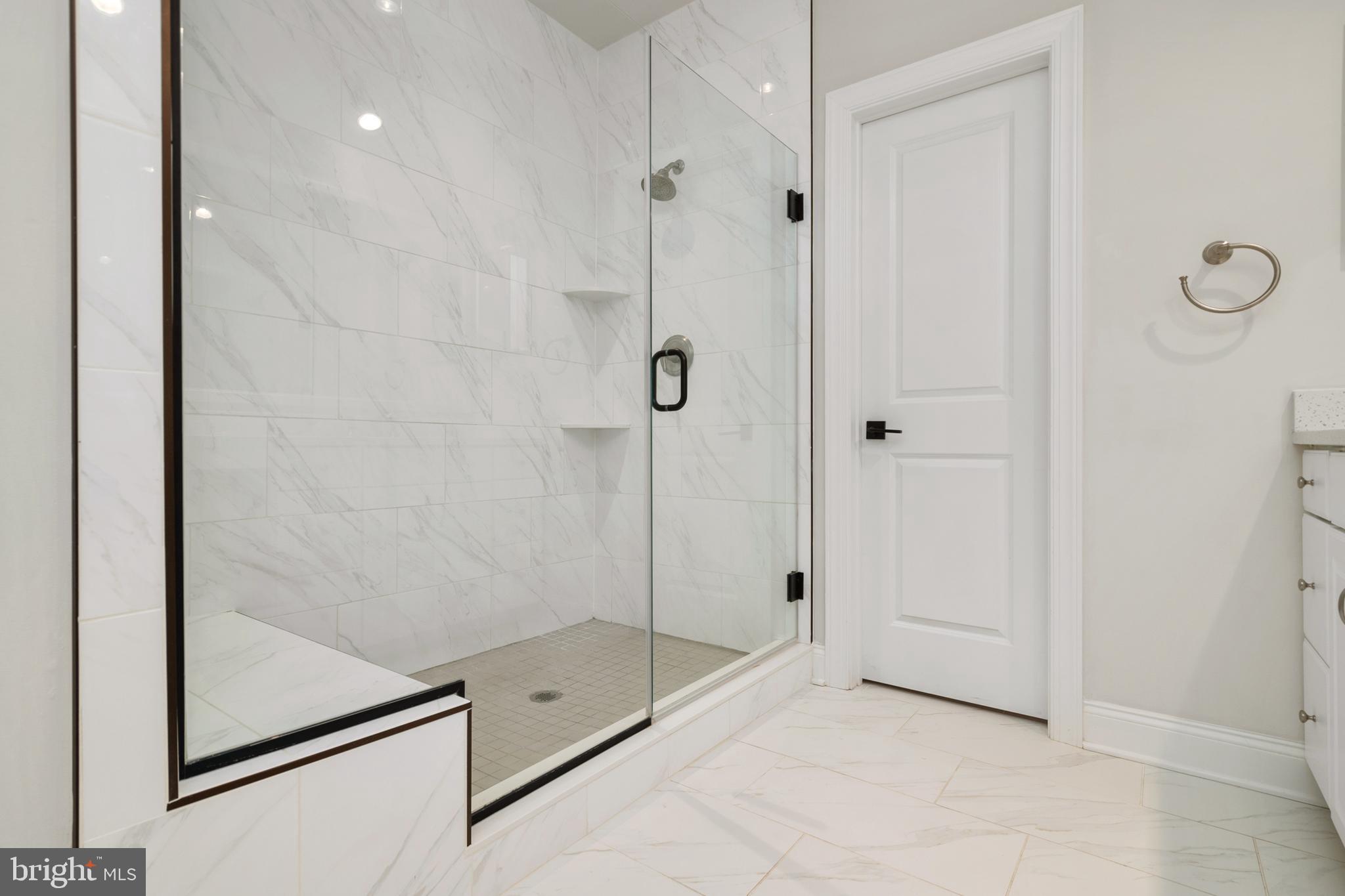 8631 St Anthony Drive Severn, MD 21144 - Photo 21 of 41 a bathroom with a shower