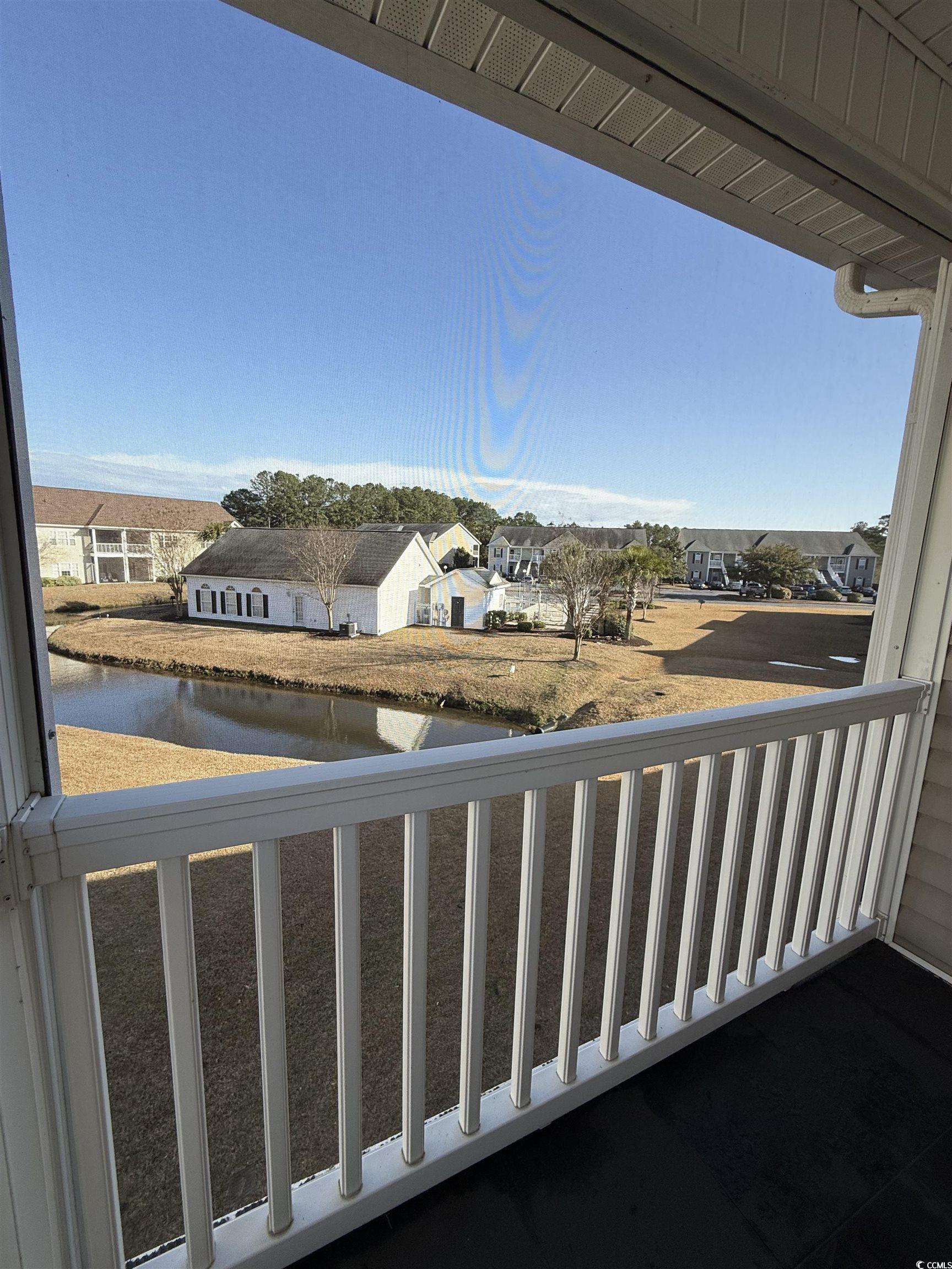 213 Wando River Road Myrtle Beach, SC 29579 - Photo 15 of 16 Balcony with a water view and a residential view