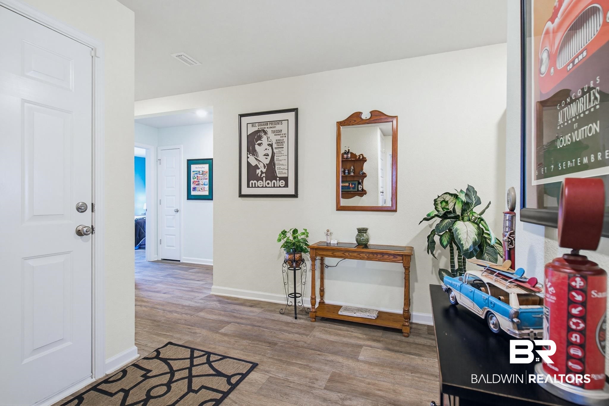 261 Fulham Lane Foley, AL 36535 - Photo 21 of 50 Corridor featuring baseboards and light wood finished floors