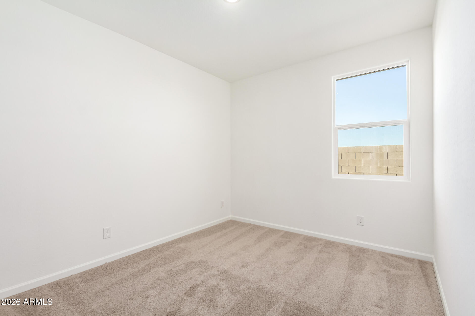 13232 West W Ranch Peoria, AZ 85383 - Photo 12 of 24 an empty room with a window
