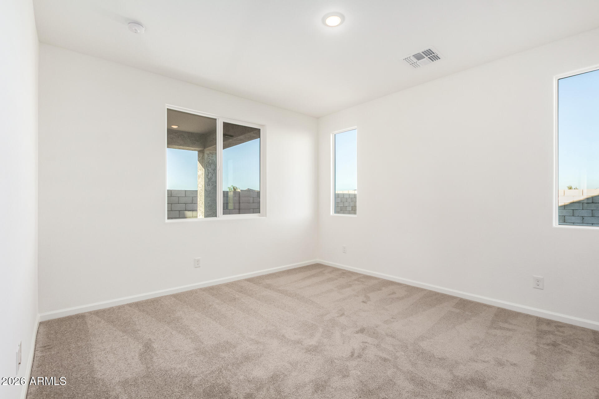 13232 West W Ranch Peoria, AZ 85383 - Photo 7 of 24 an empty room with a window