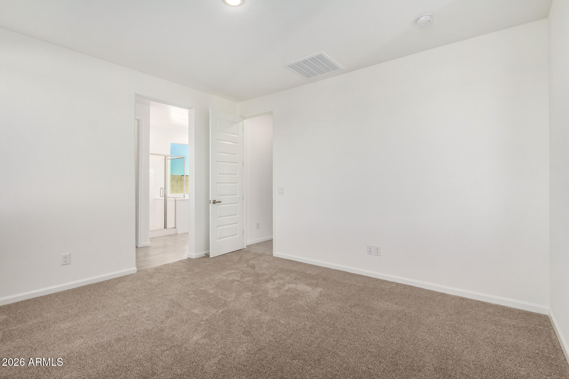 13232 West W Ranch Peoria, AZ 85383 - Photo 8 of 24 a view of an empty room and window
