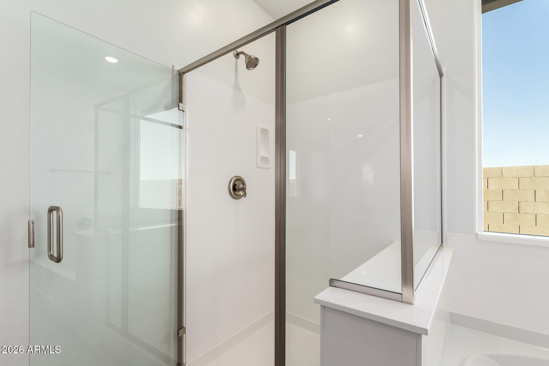 13232 West W Ranch Peoria, AZ 85383 - Photo 10 of 24 a bathroom with a shower