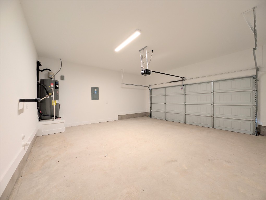 113 Sycamore Pnes Lane Kyle, TX 78640 - Photo 11 of 32 an empty room with entrance and stairs