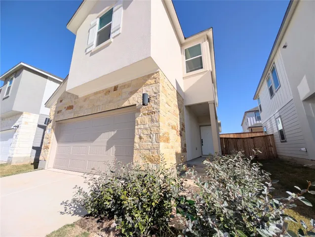 a view of a back yard of the building