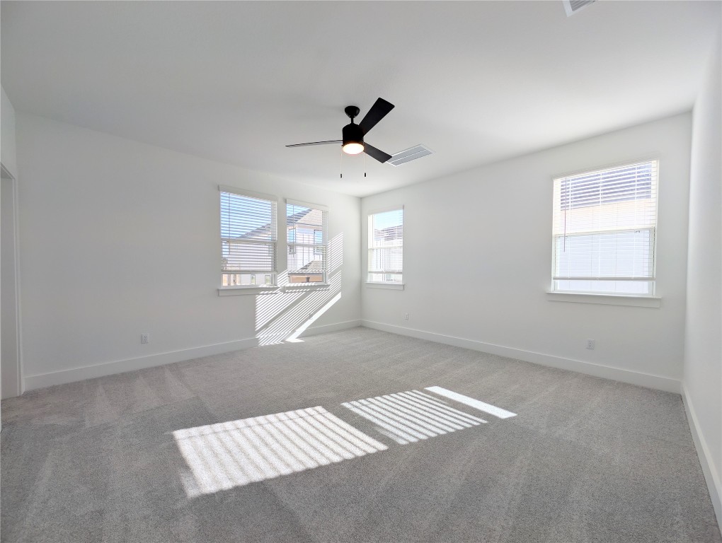 113 Sycamore Pnes Lane Kyle, TX 78640 - Photo 23 of 32 a view of an empty room with a window