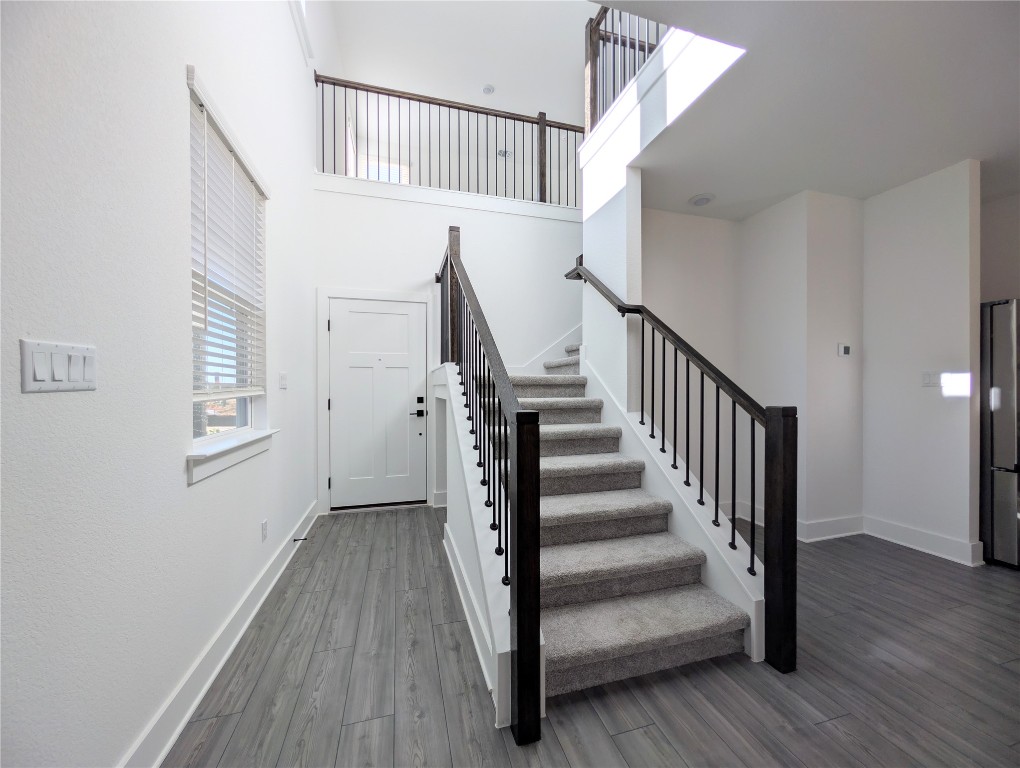 113 Sycamore Pnes Lane Kyle, TX 78640 - Photo 3 of 32 a view of entryway with wooden floor