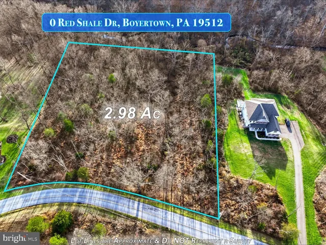 a view of a sign board with a small yard