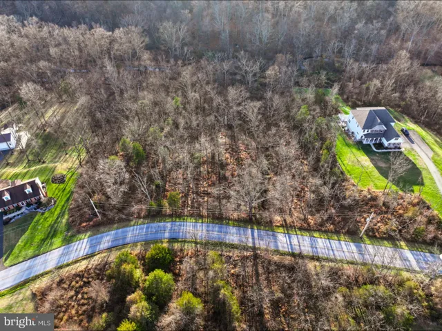 a view of swimming pool with a yard