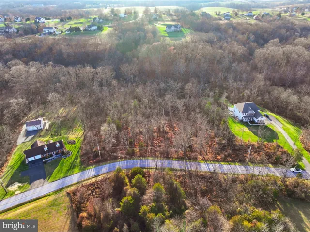 a view of a street sign on the side of the road