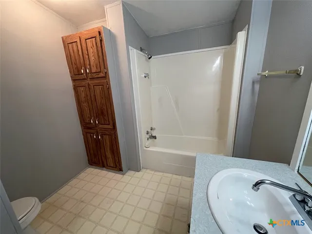 a bathroom with a sink and a tub