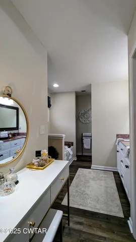 a view of kitchen center with sink and living room