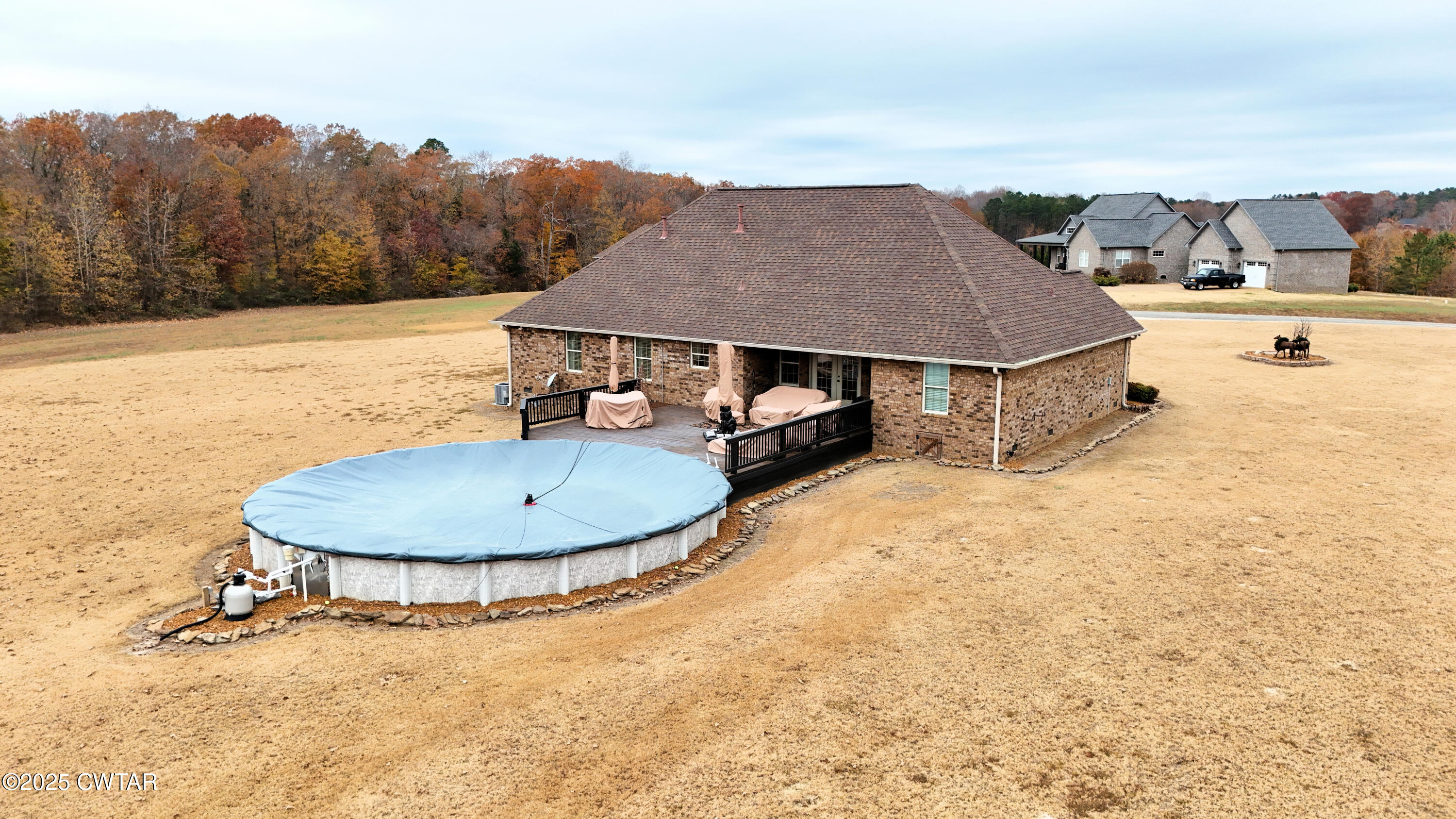 255 Ridgewood Drive Henderson, TN 38340 - Photo 2 of 25 an aerial view of a house with table and chairs