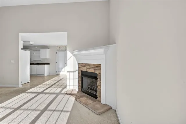 a living room with a fireplace