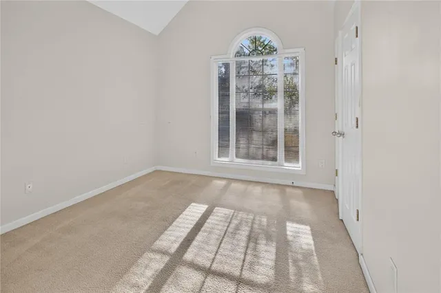 an empty room with windows