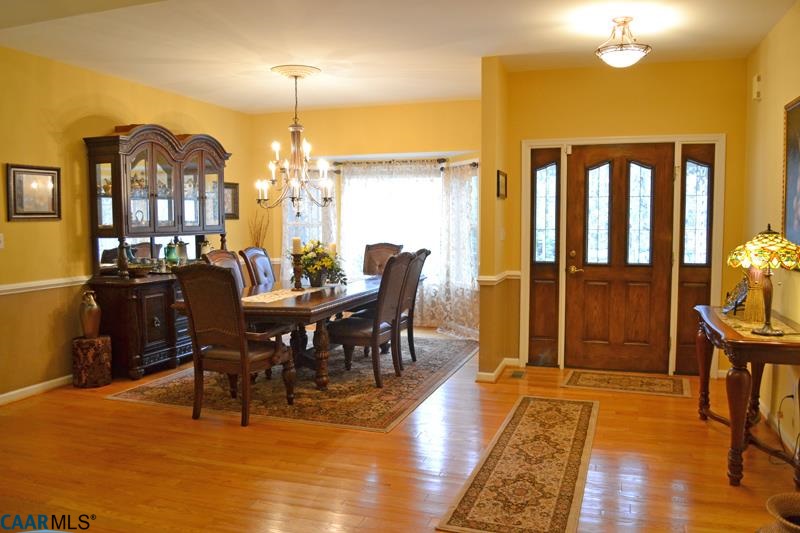 10 Out Of Bounds Road Palmyra, VA 22963 - Photo 2 of 19 a view of a dining room with furniture window and wooden floor