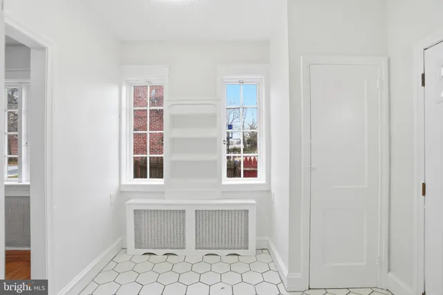 a view of an empty room and window